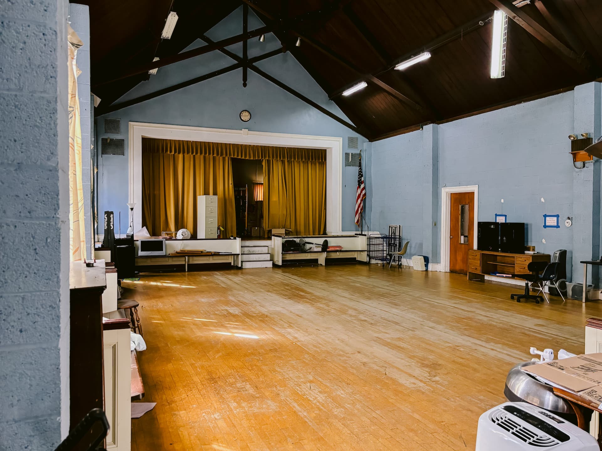 Auditorium stage and hardwood floor